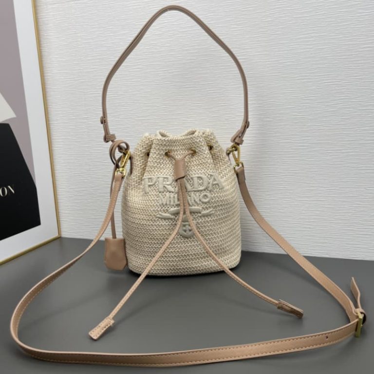 High quality Prada women woven bucket bag shoulder bag straw bag front iconic logo pattern-1